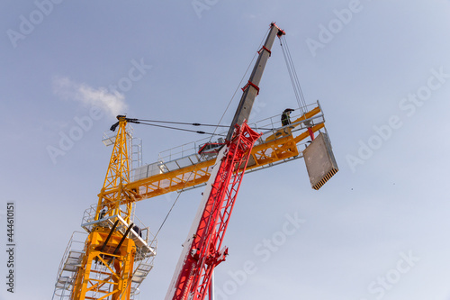 Wallpaper Mural Construction crane assembly stage. Tower crane assembly. Installation of a construction crane before starting construction. Torontodigital.ca