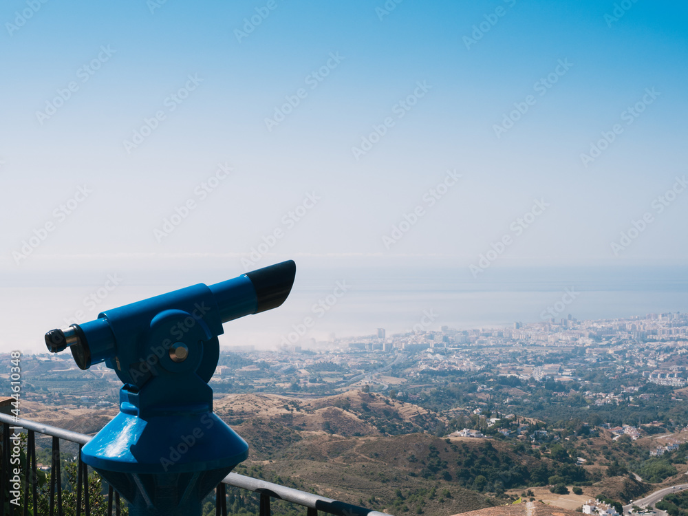 Blue payment spyglass in Mijas pueblo viewpoint with views of Mijas coast and Fuengirola