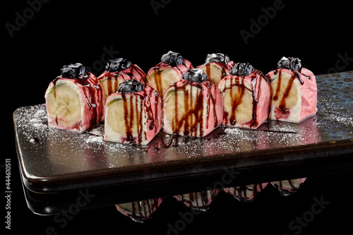 Fruit sushi rolls with cream cheese, banana, blueberries