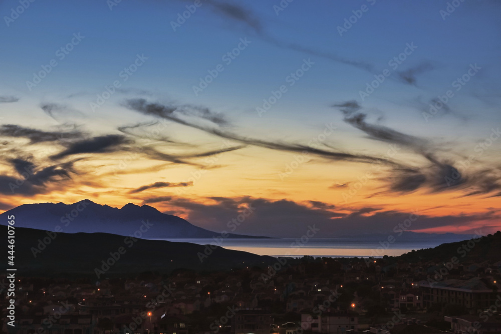 Gokceada city center, sea view and Samothrace island at sunset . At dawn between the sea and the mountains. Gokceada, Imbros, Canakkake Turkey