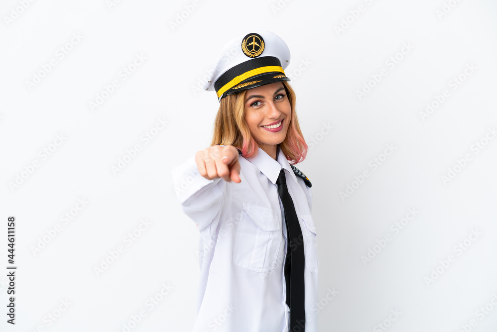 Airplane pilot over isolated white background pointing front with happy expression Airplane pilot over isolated white background pointing front with happy expression