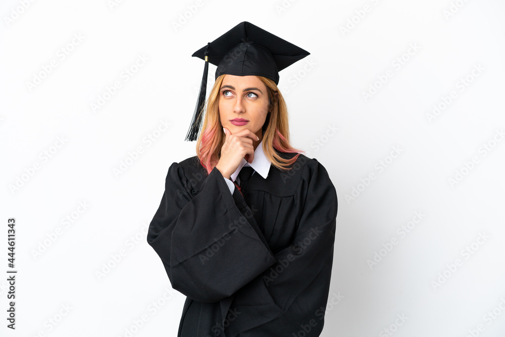 Young university graduate over isolated white background having doubts