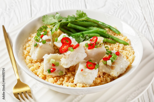 cod with bulgur, steamed green beans, top view