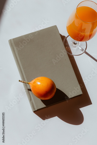 Orange fruit and journal concept, for mood and lifestyle pictures on Instagram