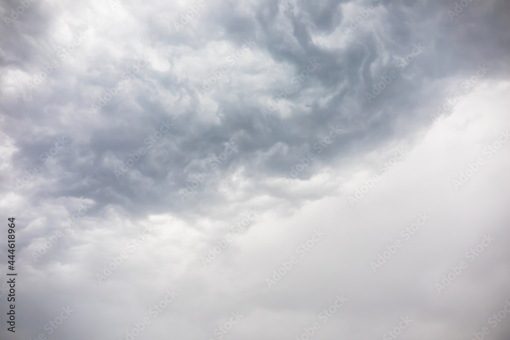 Overcast weather above dark grey sky. Aggressive rain clouds floating before thunder storm, abstract of nature. Dramatic mood scene environment background. Natural cloudscape in dull and moody weather Overcast weather above dark grey sky. Aggressive rain clouds floating before thunder storm, abstract of nature. Dramatic mood scene environment background. Natural cloudscape in dull and moody weather