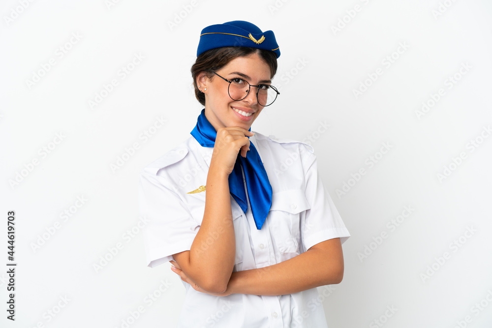 Airplane stewardess caucasian woman isolated on white background with glasses and smiling Airplane stewardess caucasian woman isolated on white background with glasses and smiling