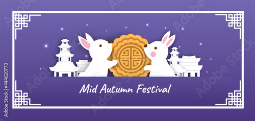 Mid autumn festival banner with cute rabbits and moon cake in paper cut style