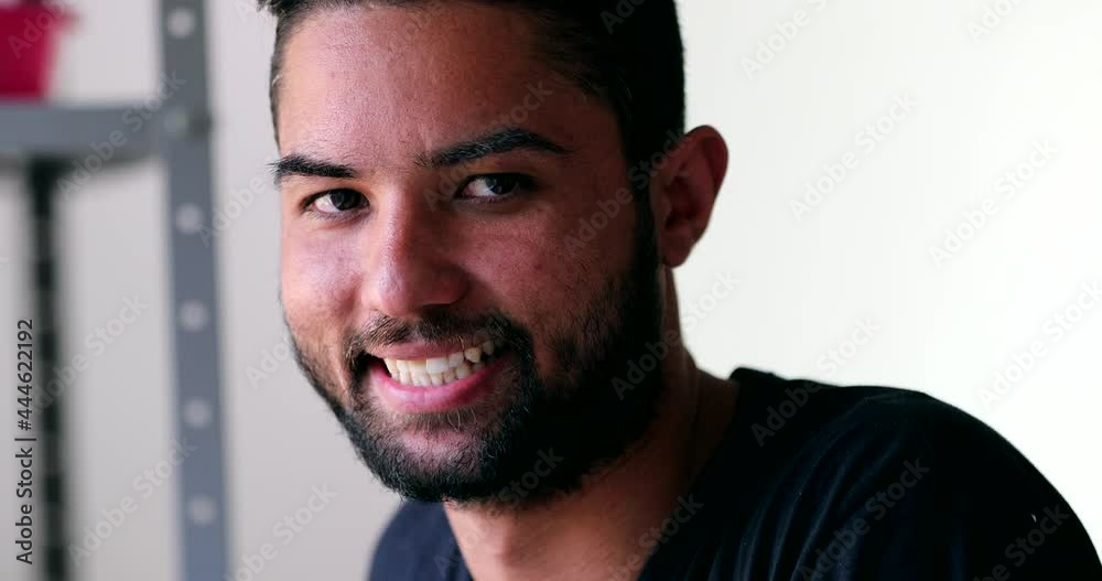 Portrait hispanic young man smiling, close-up face latin american person Portrait hispanic young man smiling, close-up face latin american person