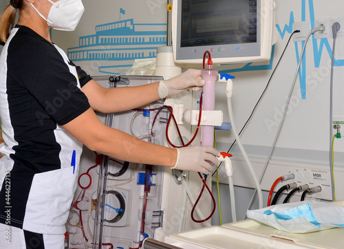 medical staff, a doctor or a nurse, does her job 