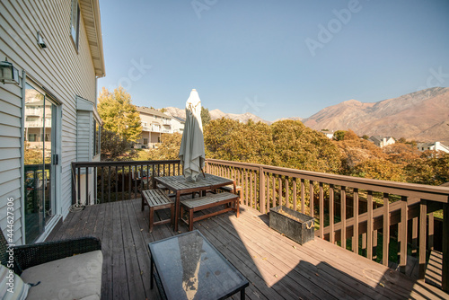 View of Mount Timpanogos, Wasatch mountains from a deck patio of a house © Jason