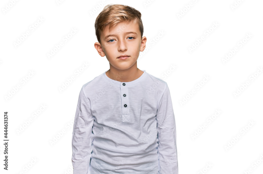 Little caucasian boy kid wearing casual clothes relaxed with serious expression on face. simple and natural looking at the camera. Little caucasian boy kid wearing casual clothes relaxed with serious expression on face. simple and natural looking at the camera.