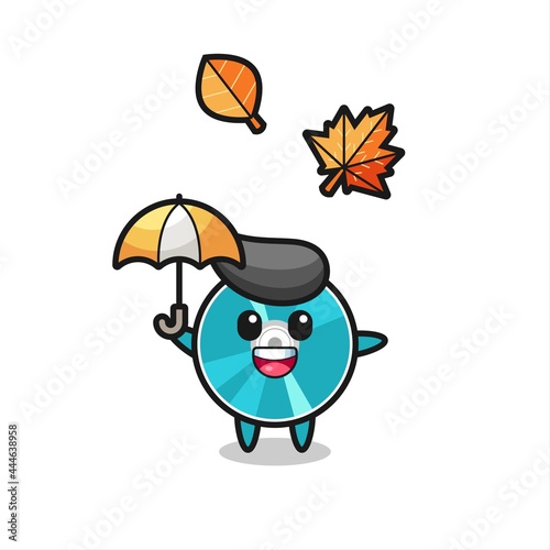 cartoon of the cute optical disc holding an umbrella in autumn