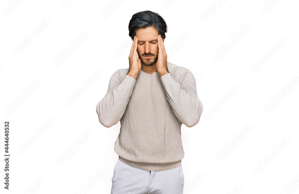 Young hispanic man wearing casual clothes suffering from headache desperate and stressed because pain and migraine. hands on head. Young hispanic man wearing casual clothes suffering from headache desperate and stressed because pain and migraine. hands on head.