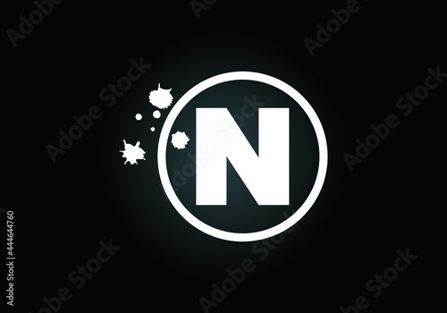 Initial N monogram letter alphabet in a circle with brush splash. Font emblem. Modern vector logo design for painting business and company identity.