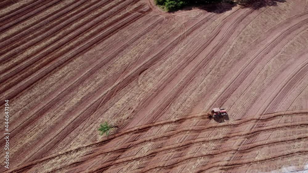 Farmer is using farming machinery for planting process, Brazilian farm. 4K. Farmer is using farming machinery for planting process, Brazilian farm. 4K.