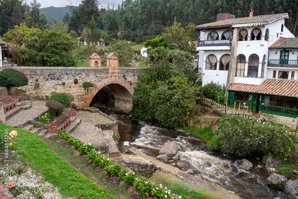 Stone bridge, Calicanto bridge with river flowing with gardens