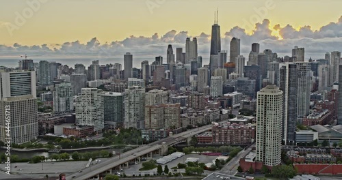Chicago Illinois cinematic panning aerial over Fulton River West Loop and Gate District with dramatic sunrise clouds - 6k footage - August 2020 photo