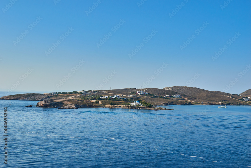 Parikia, Greece - June 2017: Port and the town Parikia as seen from a ferry during the loading of the ship, Paros island in Greece, Europe