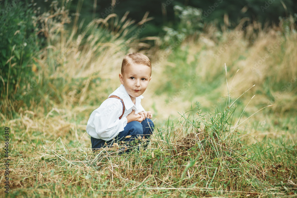 little boy is playing in the outdoor little boy is playing in the outdoor
