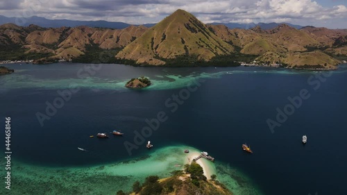 Aerial View Of The Blue Ocean And Coastal Hills Near Labuan Bajo In Nusa Tenggara Region, East Indonesia.  photo