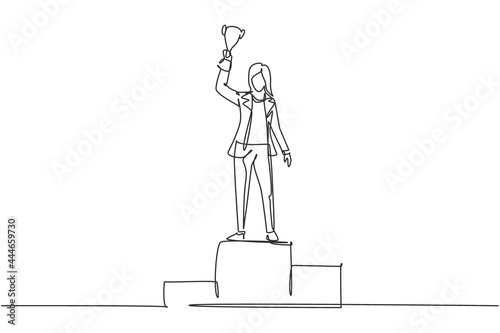Single continuous line drawing young businesswoman wearing blazer lifting golden trophy with one hand on podium. Celebrating business performance. One line draw graphic design vector illustration © Simple Line