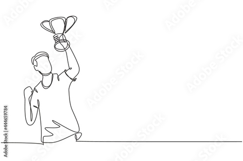 Continuous one line drawing male athlete in sports jersey holding gold trophy with one hand. Celebrating victory of national sports competition. Single line draw design vector graphic illustration