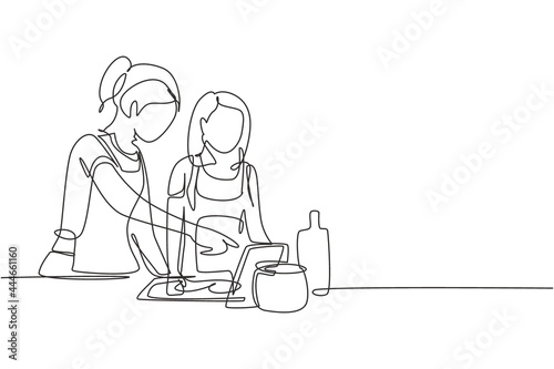 Continuous one line drawing happy mother and daughter cooking together while watching tutorial from tablet. Learn to cook with modern technology. Single line draw design vector graphic illustration