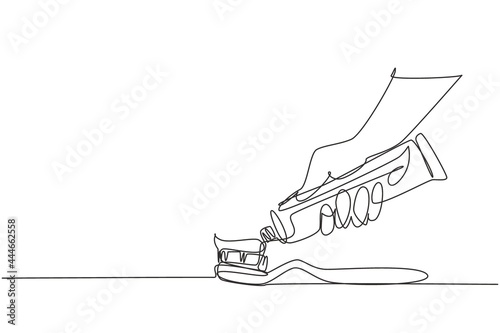 Single continuous line drawing brushing teeth. Toothbrush and toothpaste close up. Hand extrude toothpaste from tube on toothbrush. Teeth care concept. One line draw graphic design vector illustration