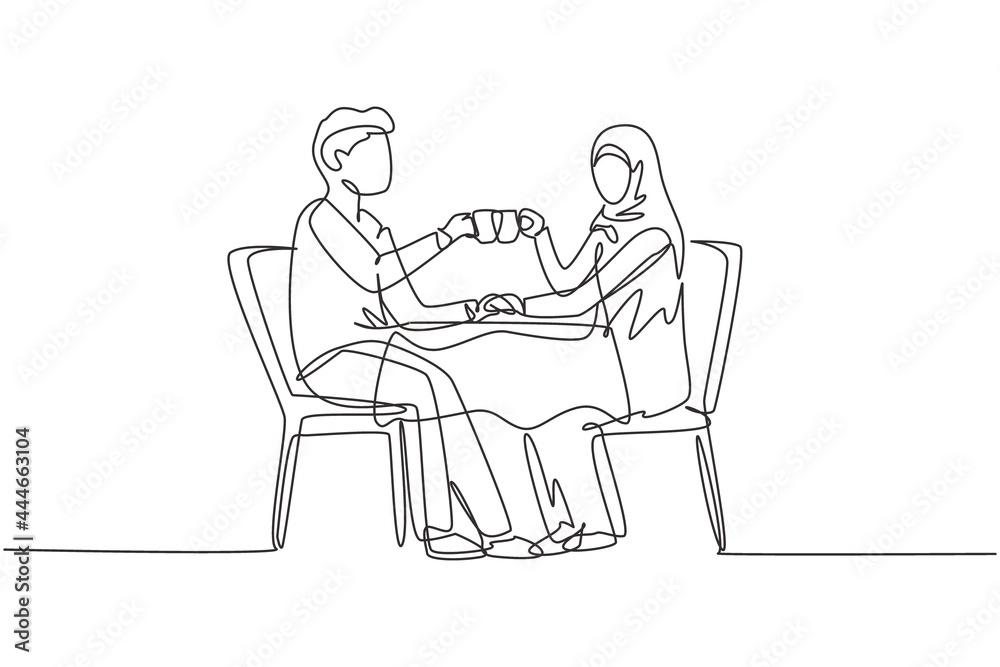 Continuous one line drawing young Arabian couple having romantic dinner, both holding cups. celebrating wedding anniversary at luxury restaurant. Single line draw design vector graphic illustration