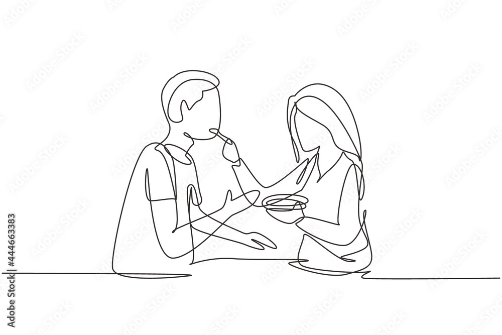 Continuous one line drawing romantic woman feeds her husband. Happy couple having dinner together at restaurant. Celebrate wedding anniversaries. Single line draw design vector graphic illustration Continuous one line drawing romantic woman feeds her husband. Happy couple having dinner together at restaurant. Celebrate wedding anniversaries. Single line draw design vector graphic illustration