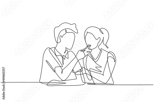 Single continuous line drawing romantic man feeds his wife. Happy young couple having dinner together at restaurant. Celebrate wedding anniversaries. One line draw graphic design vector illustration