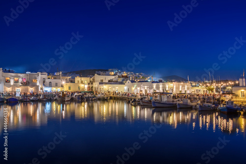 Iconic view from the picturesque seaside village of Naousa in the island of Paros, Cyclades, Greece, during summer period © panosk18