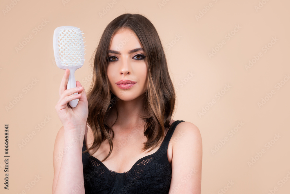 Woman brushing straight natural hair with comb. Girl combing beautiful long healthy hair with hairbrush. Hair care beauty concept. Brushing Hair. Woman brushing straight natural hair with comb. Girl combing beautiful long healthy hair with hairbrush. Hair care beauty concept. Brushing Hair.