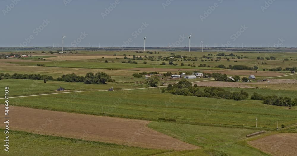 Wilson Kansas Aerial Wind Turbines produce alternative fuel across the agricultural landscape of mid west America - 6k footage - August 2020