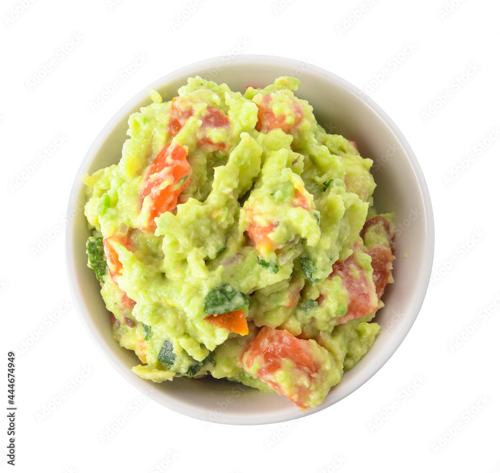 Bowl with tasty guacamole on white background