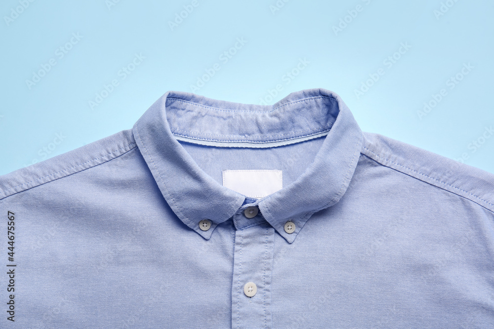 Stylish male shirt on color background Stylish male shirt on color background