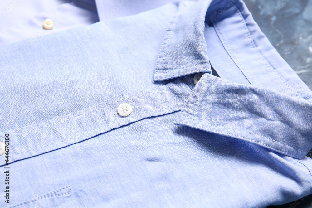 Stylish male shirt on color background, closeup Stylish male shirt on color background, closeup