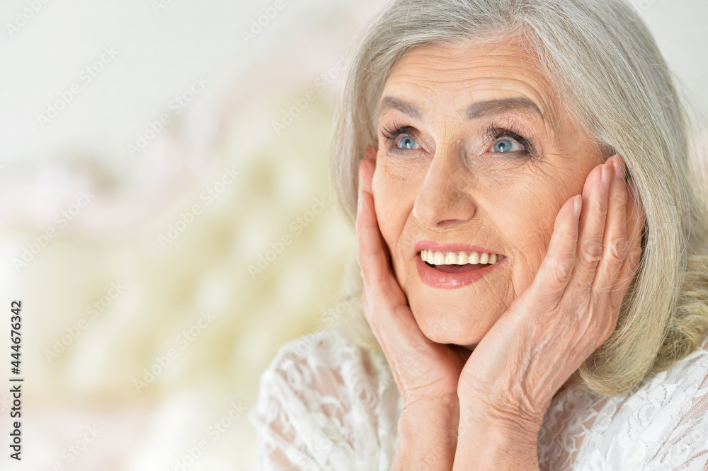 Close up portrait of happy senior woman