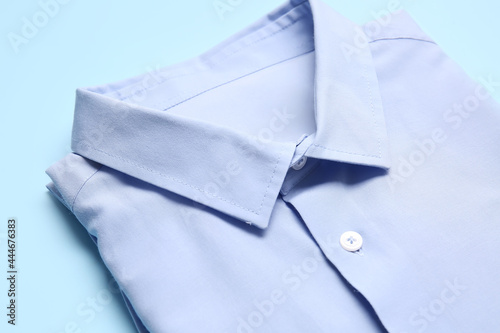 Stylish male shirt on color background, closeup