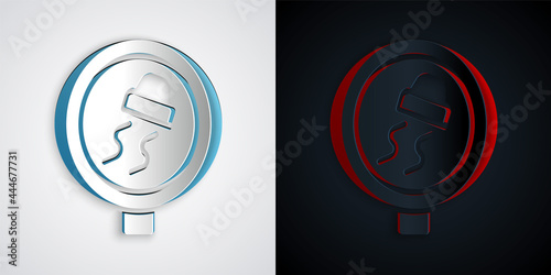 Paper cut Slippery road traffic warning icon isolated on grey and black background. Traffic rules and safe driving. Paper art style. Vector