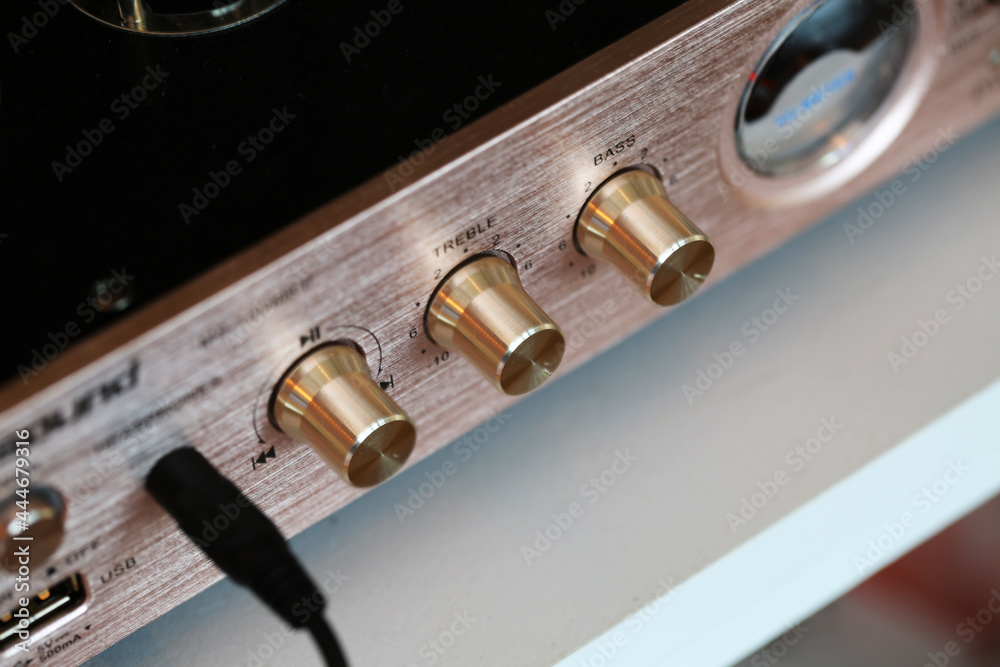 Close-up shot of a metal button that controls the volume of audio instruments, etc. Close-up shot of a metal button that controls the volume of audio instruments, etc.