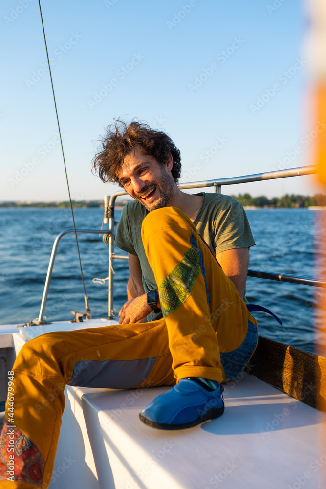 portrait of a laughing man on a yacht