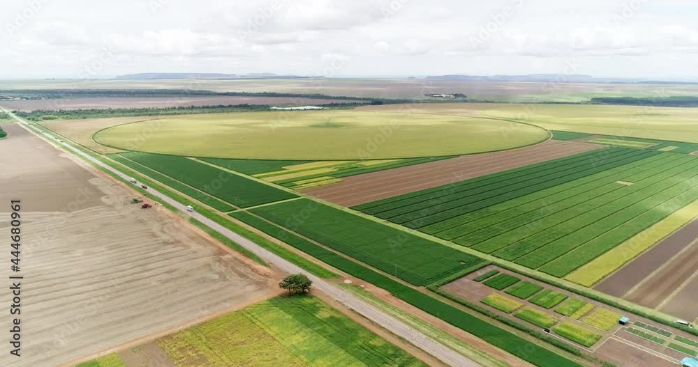 Aerial flying over fields with straw bales at harvesting time. Soybean, sunflowers and maize or corn. 4K. Aerial flying over fields with straw bales at harvesting time. Soybean, sunflowers and maize or corn. 4K.