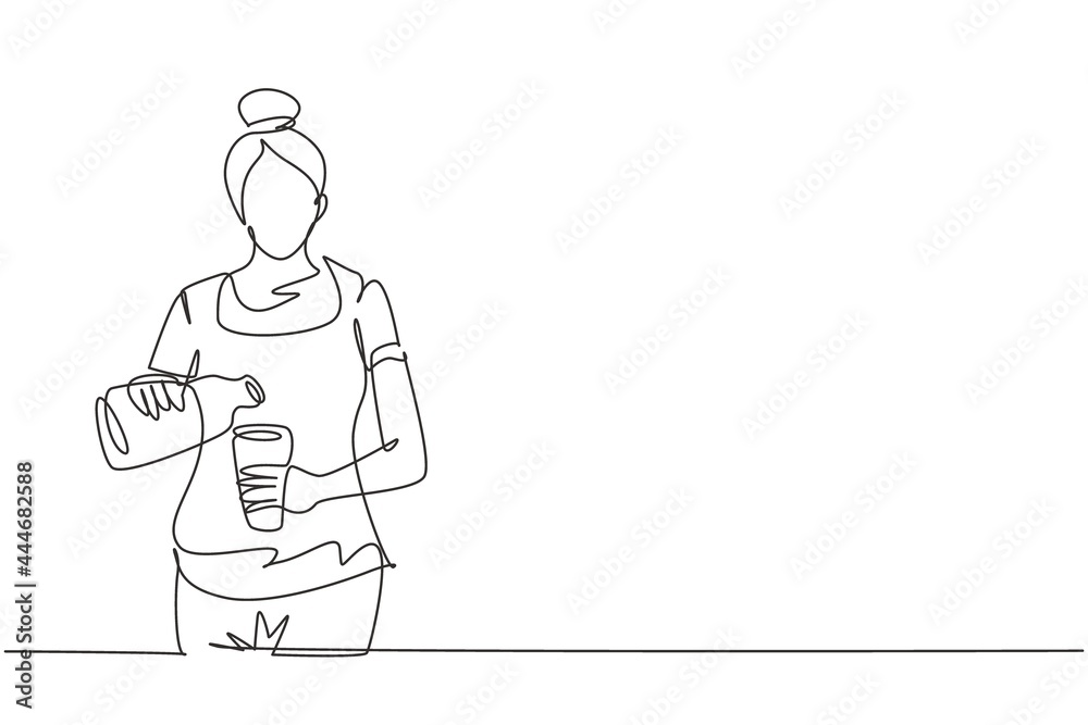 Single one line drawing young beautiful woman pouring orange juice into glass from bottle while having breakfast at home. Healthy lifestyle. Continuous line draw design graphic vector illustration