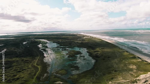 Reflection Through Swamps Near Dune Beach At National Park In Texel Island, North Holland, Netherlands. - Aerial Shot photo
