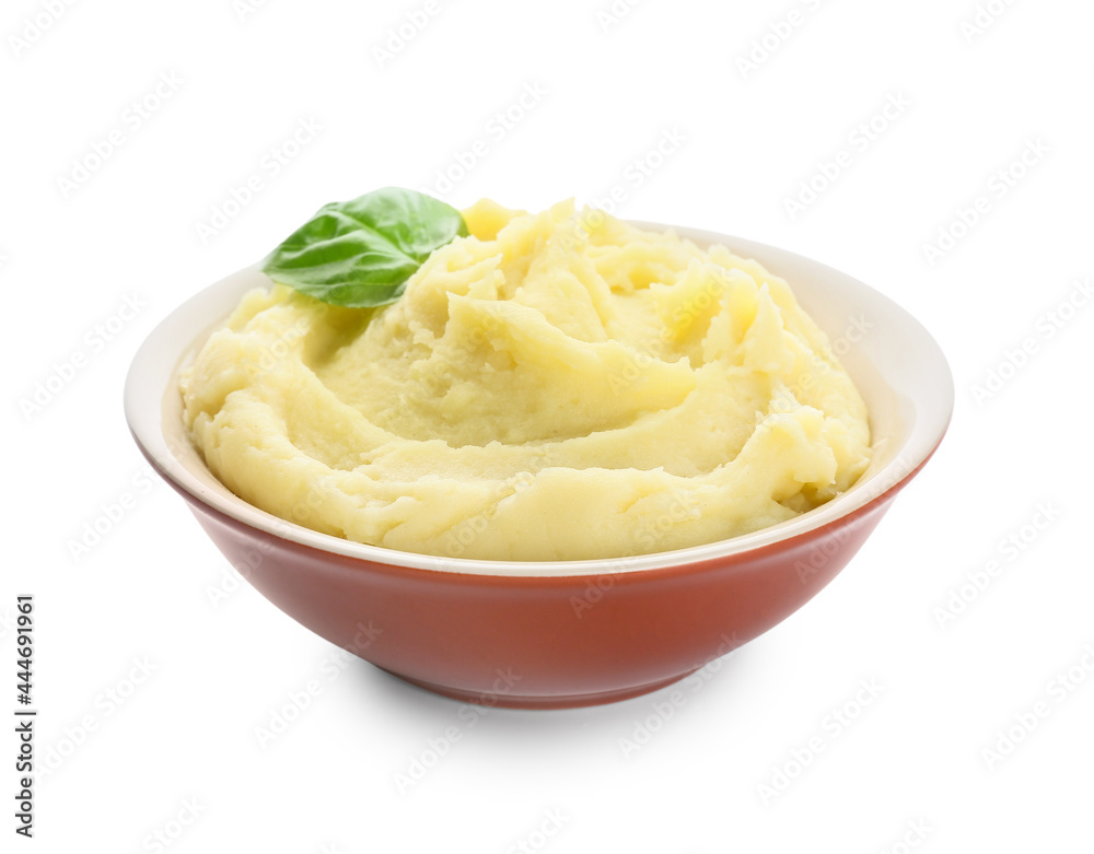 Bowl with tasty mashed potatoes on white background