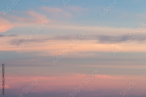 Fototapeta Naklejka Na Ścianę i Meble -  Sunset sky background with pink, purple and blue dramatic colorful clouds, vast sunset sky landscape