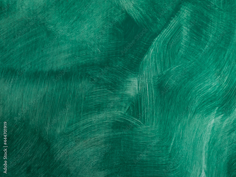 Fototapeta premium Background texture of a wall painted in green. Textured brush strokes. A wall with thin, irregular stripes.