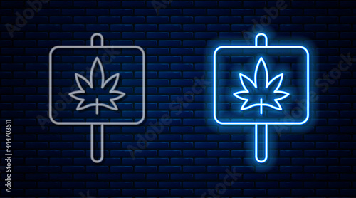 Glowing neon line Medical marijuana or cannabis leaf icon isolated on brick wall background. Hemp symbol. Vector