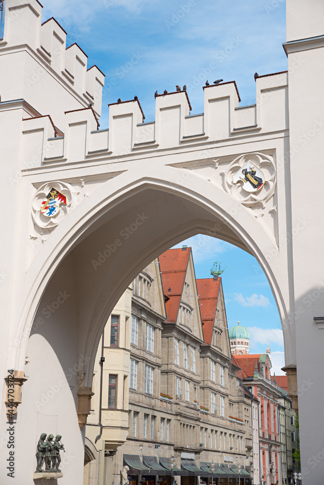 Naklejka premium view through historic Karlstor, city gate in the old town of munich